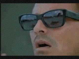 Kevin Costner Slowly Taking Glasses Off